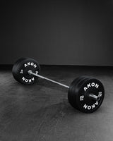 Packs Discos Olímpicos Bumper Negros + Barra Opcional